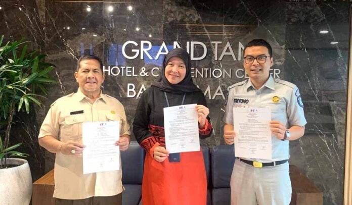 dengan Hotel Grand Tan Banjarmasin