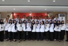 melalui Upacara Khidmat