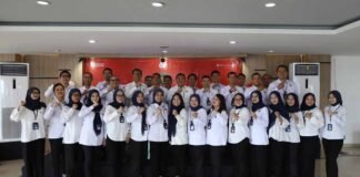 melalui Upacara Khidmat