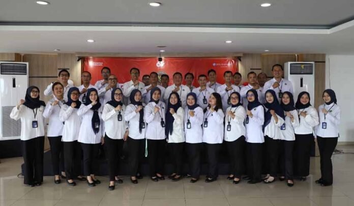 melalui Upacara Khidmat